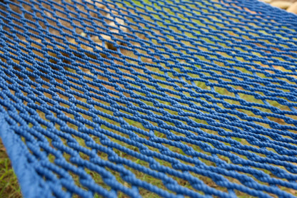 Close view of the hand-woven Dark Blue soft-spun polyester rope weave of the Jumbo Rope Hammock.