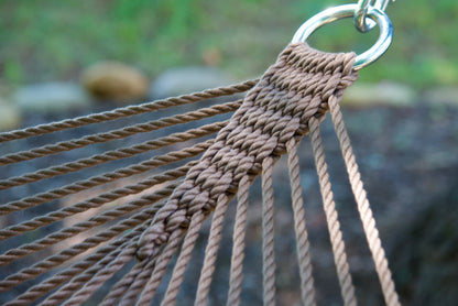 Close view of the O-ring and gathered Mocha end cords of the Jumbo Rope Hammock.