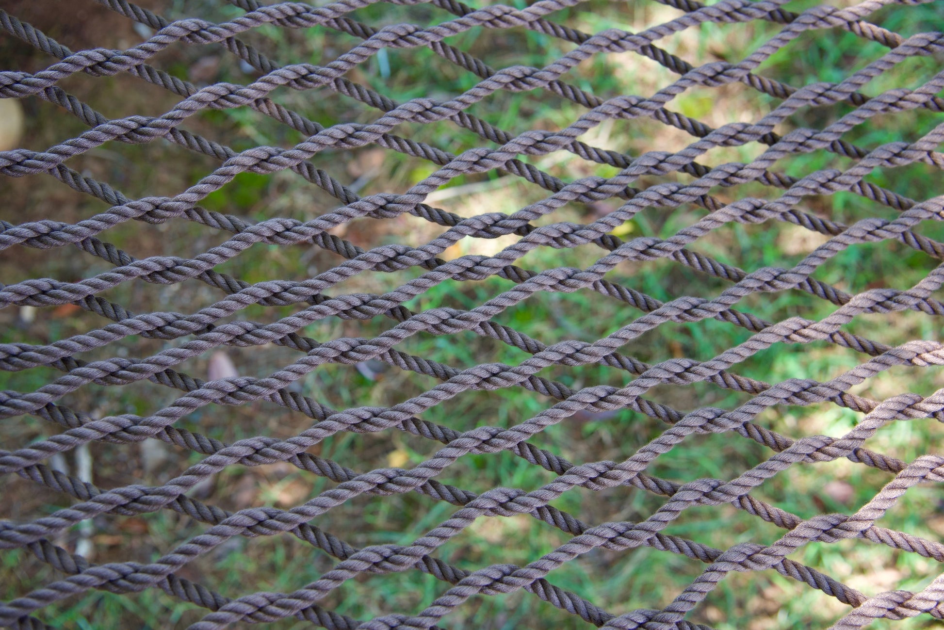Close view of the hand-woven Mocha soft-spun polyester rope weave of the Jumbo Rope Hammock.