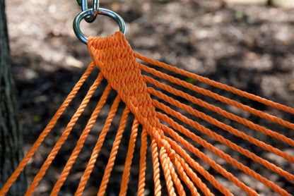 Close view of the O-ring and gathered Orange end cords of the Jumbo Rope Hammock.
