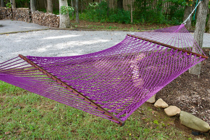 Close view of the Purple polyester rope bed and wood spreader bar of the Jumbo Rope Hammock.