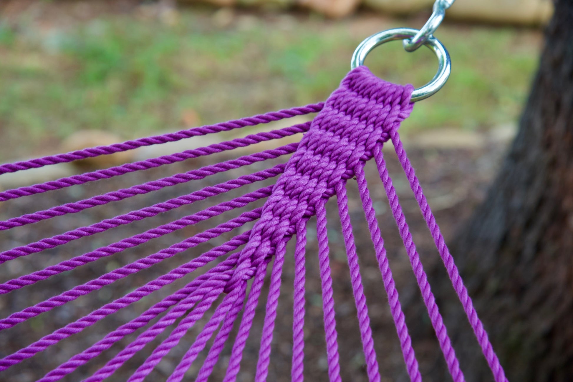 Close view of the O-ring and gathered Purple end cords of the Jumbo Rope Hammock.