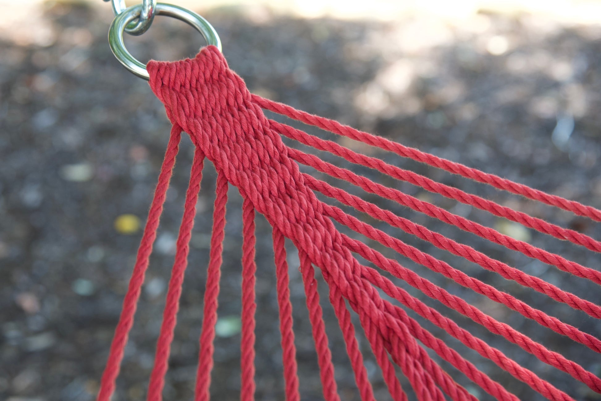 Close view of the O-ring and gathered Red end cords of the Jumbo Rope Hammock.