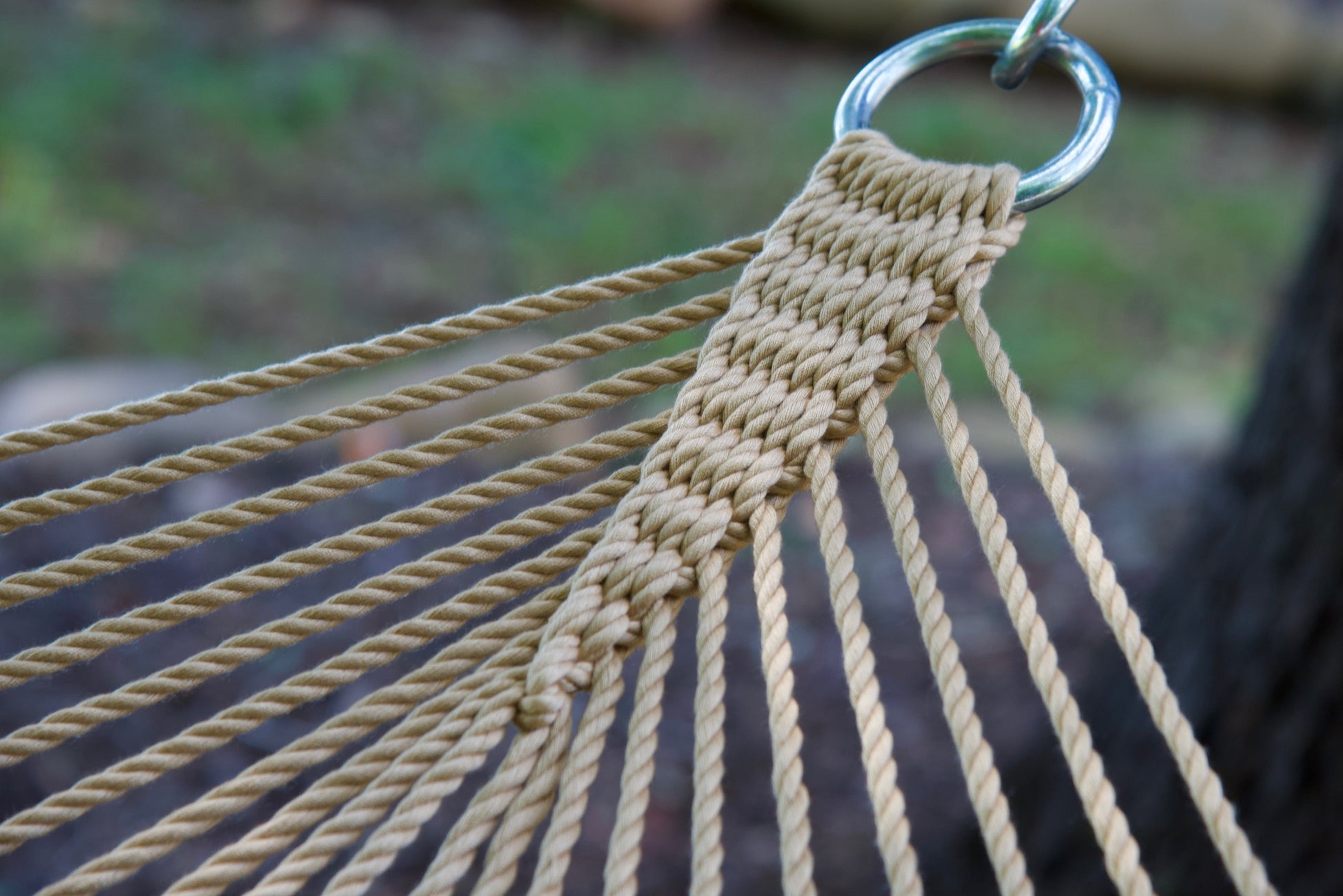 Close view of the O-ring and gathered Tan end cords of the Jumbo Rope Hammock.
