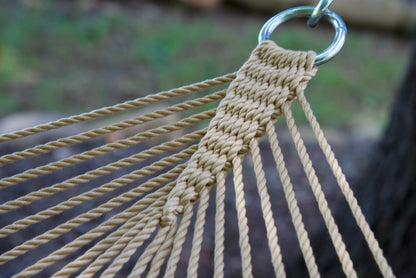 Close view of the O-ring and gathered Tan end cords of the Jumbo Rope Hammock.