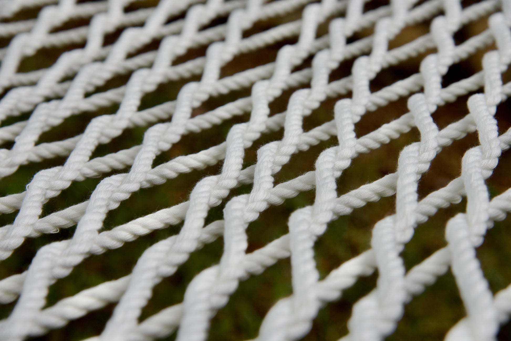 Close view of the hand-woven White soft-spun polyester rope weave of the Jumbo Rope Hammock.