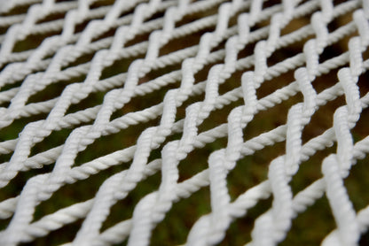 Close view of the hand-woven White soft-spun polyester rope weave of the Jumbo Rope Hammock.