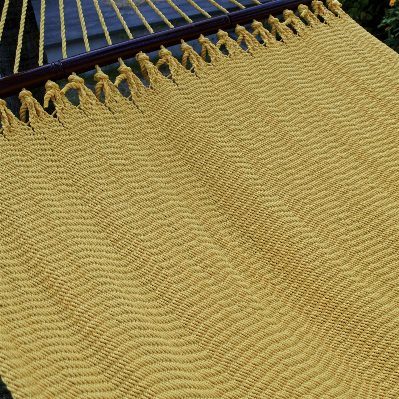 The micro-weave bed and hardwood spreader bar of the Yellow Double Caribbean Hammock