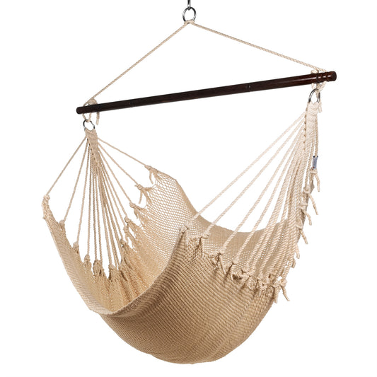 Jumbo Caribbean Hammock Chair in cream, hand-woven polyester cord with a dark hardwood spreader bar and tasseled ends, on a white background