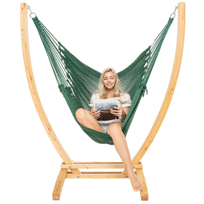 Green Jumbo Caribbean Recliner on a Siberian larch wood arc stand, woman seated with a book
