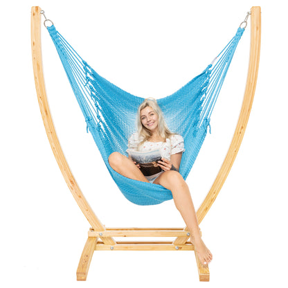 Light Blue Jumbo Caribbean Recliner on a Siberian larch wood arc stand, woman seated with a book