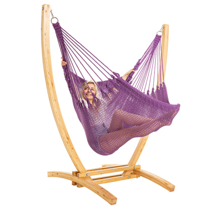 Purple Jumbo Caribbean Recliner on a Siberian larch wood arc stand, woman reclined full length