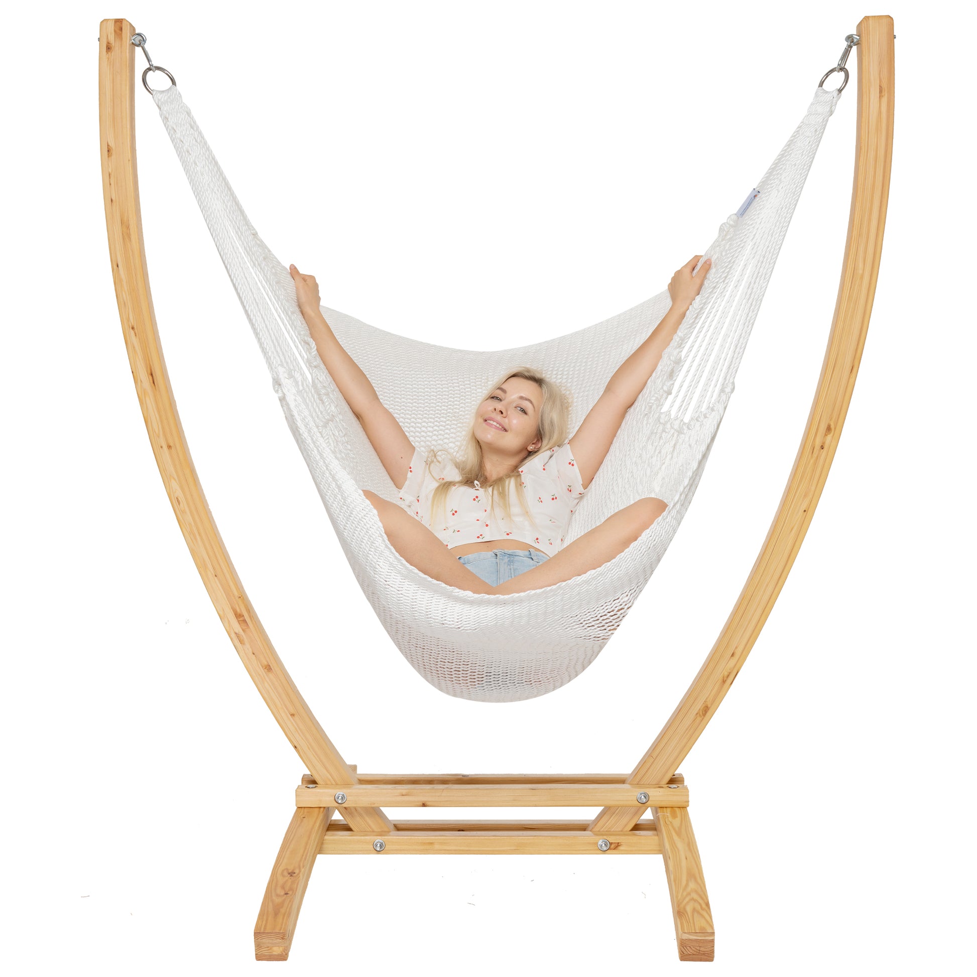 White Jumbo Caribbean Recliner on a Siberian larch wood arc stand, woman reclined with arms raised