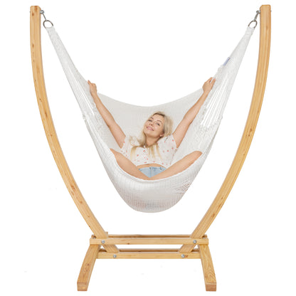 White Jumbo Caribbean Recliner on a Siberian larch wood arc stand, woman reclined with arms raised
