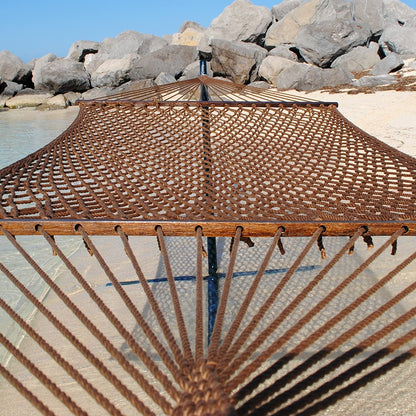Mocha Jumbo Rope Hammock on a black Tri-Beam hammock stand at the water's edge.