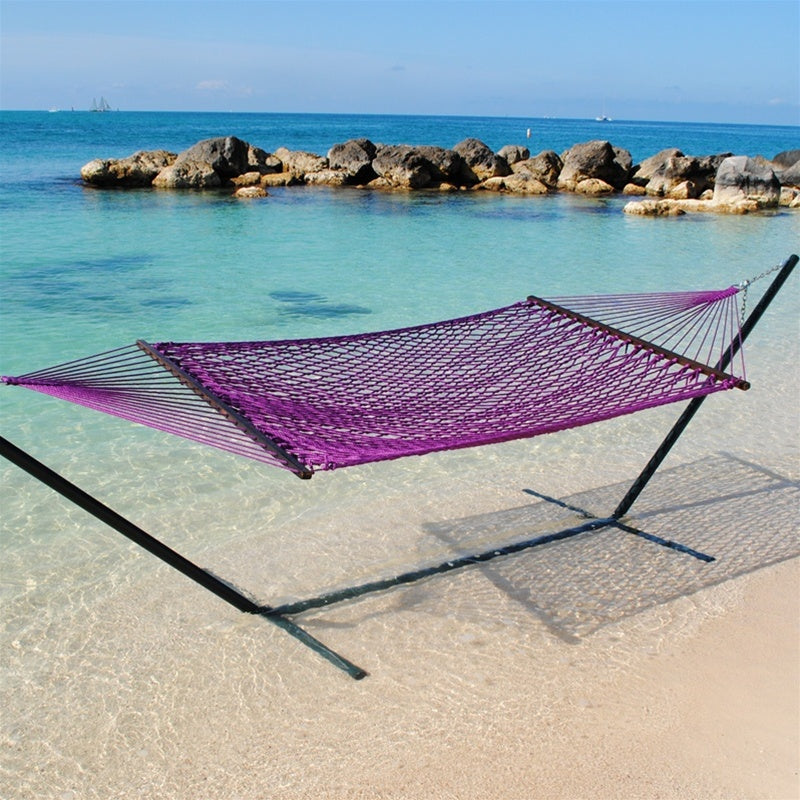 Purple Jumbo Rope Hammock on a black Tri-Beam hammock stand at the water's edge.
