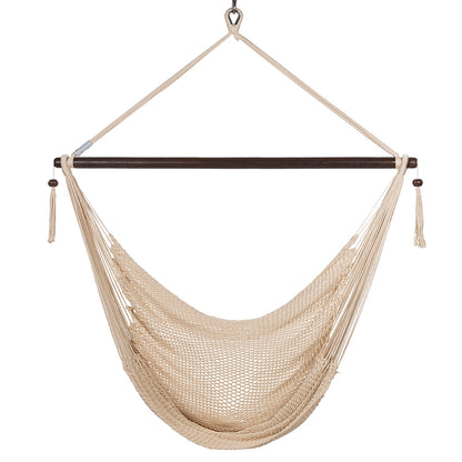 Front view of a cream Large Caribbean Hammock Chair showing the deep woven seat and built-in footrest, on a white background