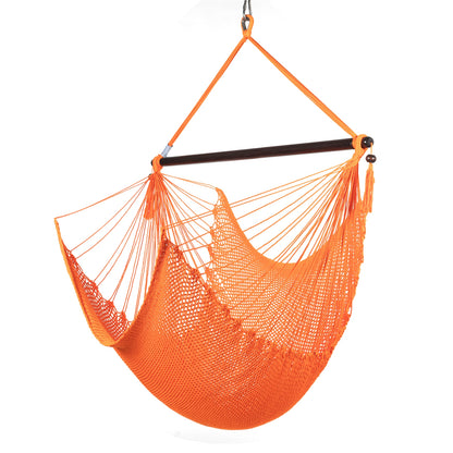 Large Caribbean Hammock Chair in orange, hand-woven polyester cord with a dark hardwood spreader bar and tasseled ends, on a white background