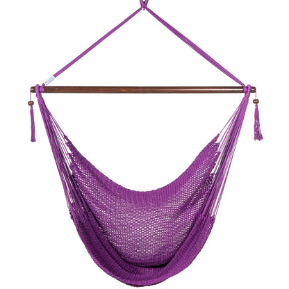 Front view of a purple Large Caribbean Hammock Chair showing the deep woven seat and built-in footrest, on a white background