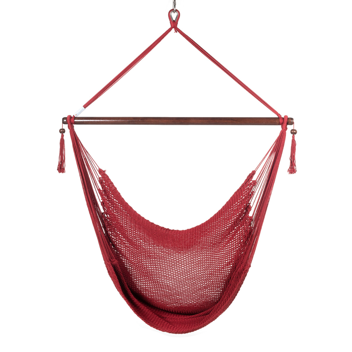Front view of a red Large Caribbean Hammock Chair showing the deep woven seat and built-in footrest, on a white background